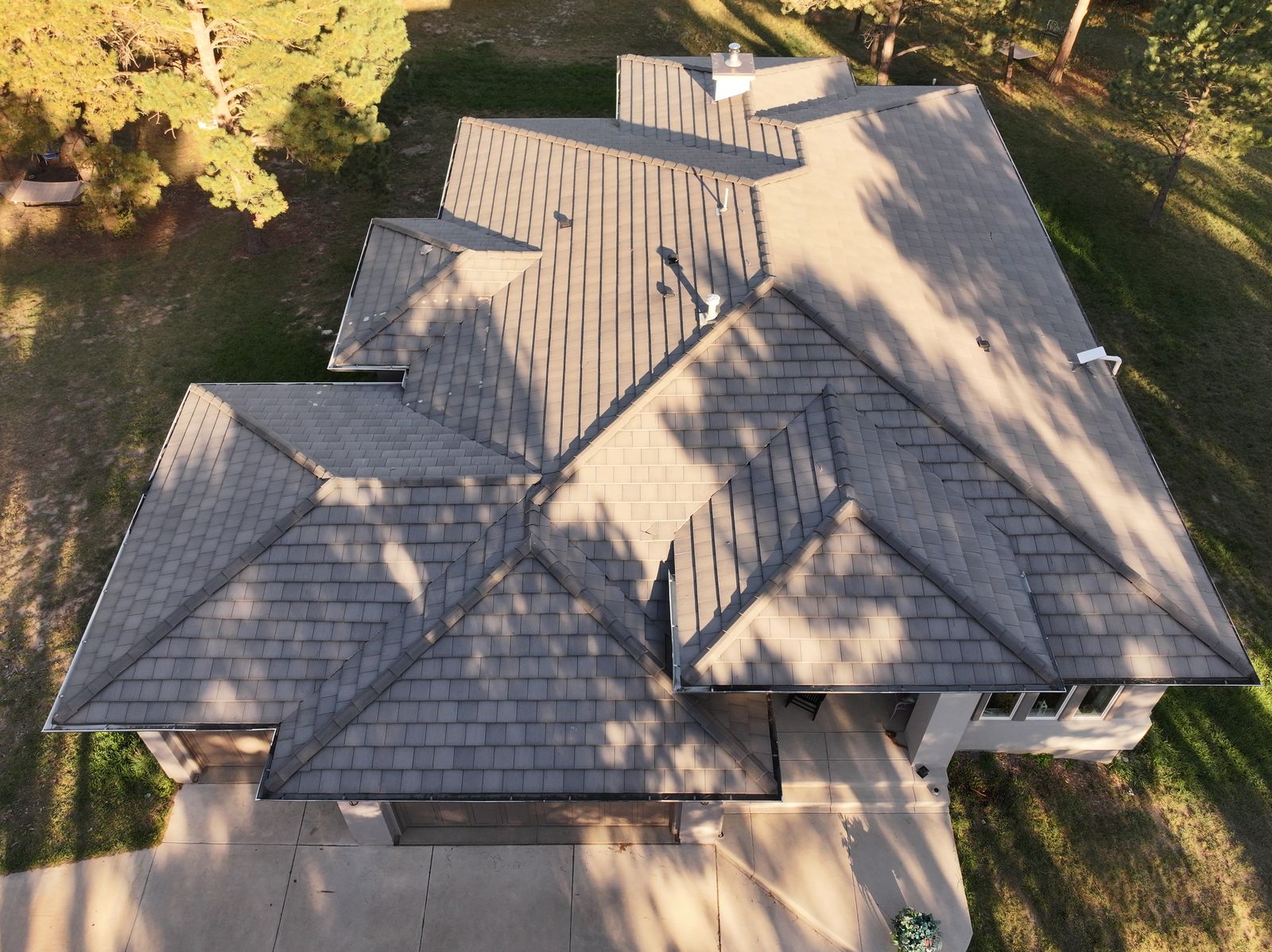 Aerial view of a completed Fixins roof in Fort Carson, Colorado Springs area
