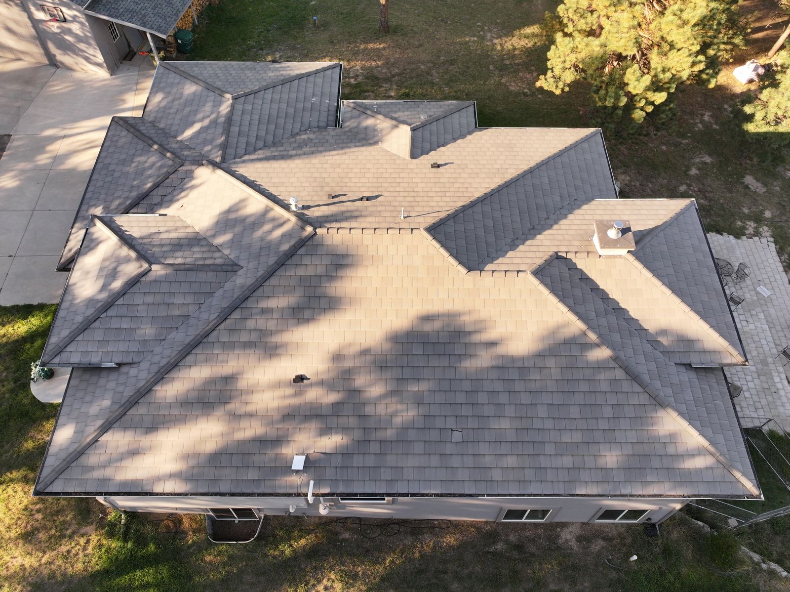Aerial view of a completed Fixins roof in Fountain, Colorado Springs area