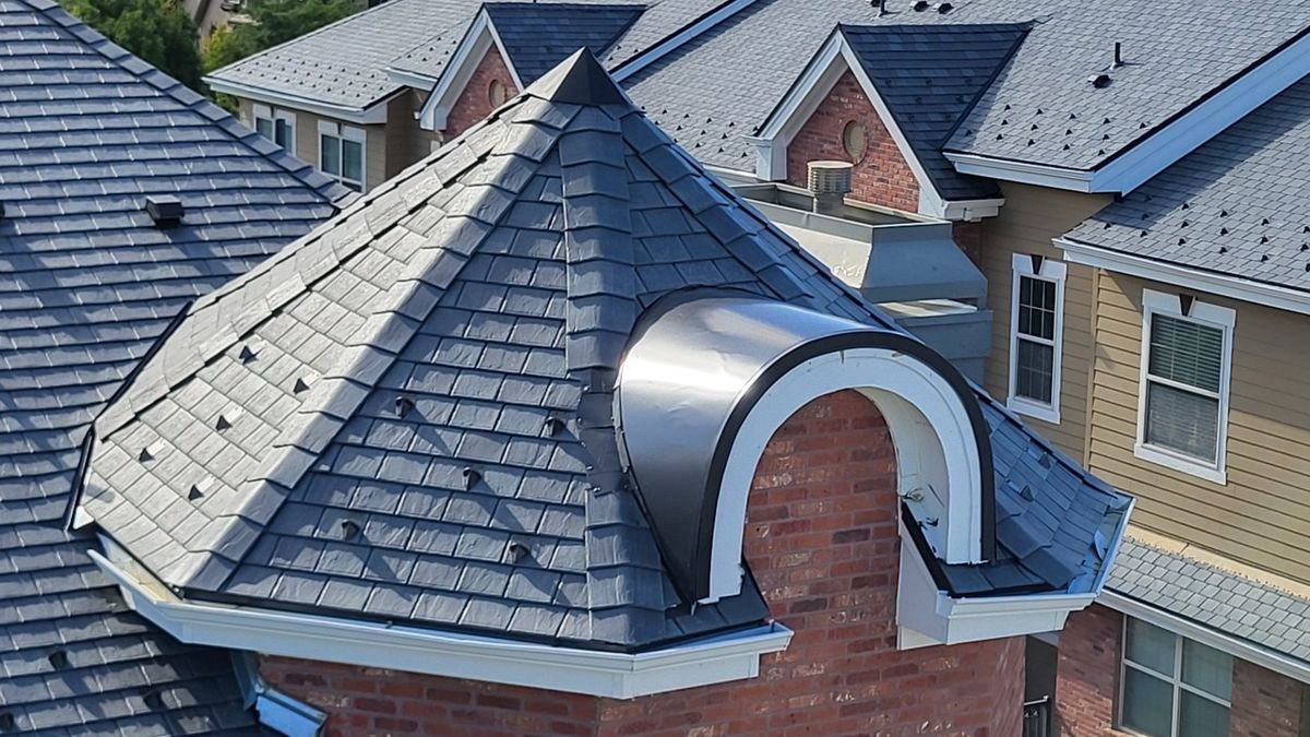 F-Wave REVIA synthetic shingles with curved radius standing seam metal by Fixins in Colorado Springs
